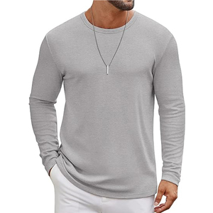 T-shirts décontractés à manches longues pour hommes européens et américains, col rond, motif gaufré, couleur unie, design épuré, printemps automne, pour la gym et le club - Product Image 1