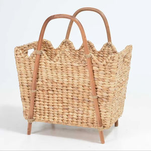 Water hyacinth basket with <b>rattan</b> handle and seashell rim Handmade <b>Storage</b> Basket Wholesale eco-friendly Made in Vietnam - Product Image 1