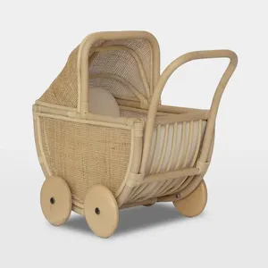 Exceptional Handwoven Natural Wicker Baby Doll Pram Rattan Toy Wooden Wheels Push Walker Carriage Nursery Decor Pretend Play Gif - Product Image 1