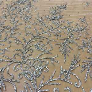 Tela de encaje bordada de poliéster con cuentas pesadas y diseño de red para vestidos de novia, disponible para suministro mundial, fabricante mayorista - Product Image 3