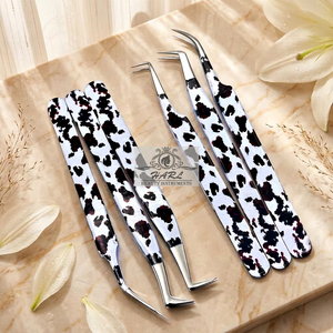 Ensemble de pinces professionnelles pour extensions de cils à motif vache, en acier inoxydable, avec prise en main parfaite, logo et emballage personnalisés - Product Image 4