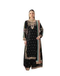 Este hermosamente diseñado conjunto tradicional de Salwar Kameez con bordes de encaje elegantes, un atuendo de diseñador de SHREE INDIAN EXPORTS. - Product Image 1