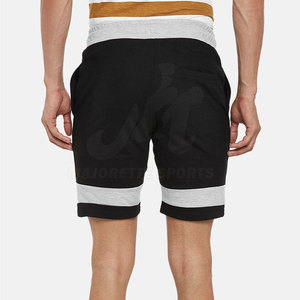 Shorts de performance élégants pour hommes, conçus pour l'extérieur, avec des imprimés graphiques numériques audacieux, en tissu respirant et confortable. - Product Image 3