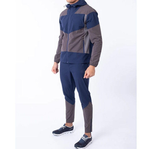 Ensemble survêtement homme en nylon coupe-vent personnalisé, veste et pantalon de jogging, couleurs contrastées, léger - Product Image 1