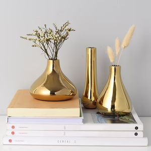 <b>Unique</b> metal flower <b>vase</b> expressing creative excellence ideal for enhancing rooms with fashionable metallic accent - Product Image 2