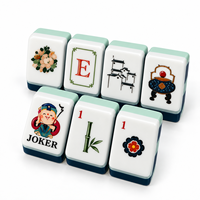 Jeu de tuiles de mahjong en acrylique bleu héritage avec motifs décoratifs sur le devant et dos colorés pour jeux de société et jeux de mahjong conviviaux