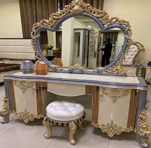Royal gold hand carved <b>console</b> <b>table</b> with a large decorative mirror and <b>marble</b> <b>top</b>, available at wholesale prices. - Product Image 6