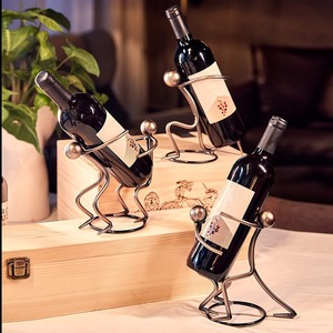 Porte-bouteille à vin en métal en forme de vague, présentoir à vin tendance et contemporain - Product Image 5
