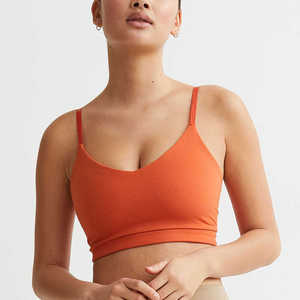 Sujetador deportivo de tirantes finos naranja para mujer, sin costuras, soporte medio, ropa deportiva para yoga, transpirable, color liso - Product Image 3