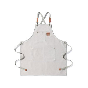 Tablier classique en cuir orange résistant à l'huile, tissé, avec bretelles croisées et poche avant pour la cuisine - Product Image 1