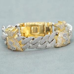 Bracelet de luxe avec maillons entrelacés incrustés de pierres étincelantes, accents dorés, éléments décoratifs en forme de couronne, fermoir boîte. - Product Image 4