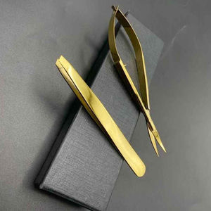 Coffret de rangement noir mat RMI et ensemble de pinces à sourcils et ciseaux à ressort plaqués or plasma - Product Image 2