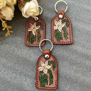 ห่วงโซ่กุญแจหนังที่แกะสลักด้วยมือรูปทรงแปลกใหม่น่ารักอุปกรณ์เสริมพวงกุญแจหนังสำหรับทุกเพศ - Product Image 2