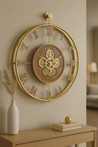 Horloge murale élégante en métal doré, idéale pour la décoration murale d'occasions spéciales, l'aménagement intérieur de luxe et les cadeaux haut de gamme, provenant d'Inde. - Product Image 2