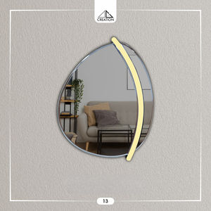 Es un espejo decorativo moderno de forma orgánica con LED acrílico, diseñado para realzar cualquier espacio habitable. - Product Image 2
