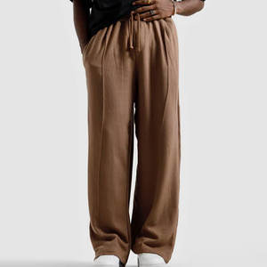 Pantalon large pour homme, design streetwear tendance, coupe confortable, idéal pour le quotidien et les voyages - Product Image 1