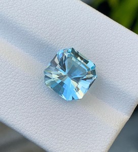 บลูโทแพซทรงคุชชั่นธรรมชาติสำหรับทำเครื่องประดับ ขายส่งจาก Zubeda Gems พร้อมใบรับรองจากผู้เชี่ยวชาญ  แบบตาแมว - Product Image 4