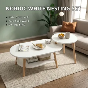 Juego de Mesa de Centro Nórdica Blanca Contemporánea de Madera Maciza Ecológica y Fácil de Limpiar, Juego de 2 Mesas Auxiliares Ovaladas para Sala de Estar - Product Image 1