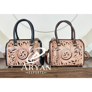 Hot Selling OEM ODM Carved Genuine Cow <b>Leather</b> Medium Speedy Duffel Bag Stylish Premium Pattern Travel Crossbody Bag for Unisex - Product Image 1