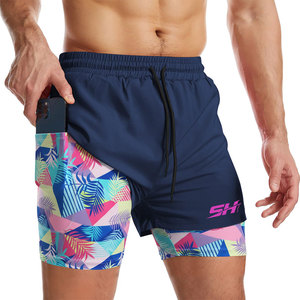 Shorts de sport 2 en 1 pour hommes au design athlétique moderne, alliant fonctionnalité, apparence élégante, look contemporain et design intelligent. - Product Image 1