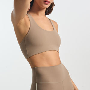 Women's Beige Racerback Sports Bra Medium Support Seamless Solid Yoga Top High Waist Shorts Set - Product Image 1
