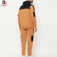 Conjunto Deportivo para Hombre con Bloques de Color en Contraste, Chaqueta con Cierre y Cuello Alto, Pantalones Jogger, Diseño Casual Urbano