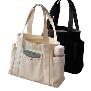 Multipurpose <b>Canvas</b> Tote <b>Bag</b> with External Pockets <b>Large</b> Capacity Cotton Handbag for Daily Shopping and Travel Convenience - Product Image 1
