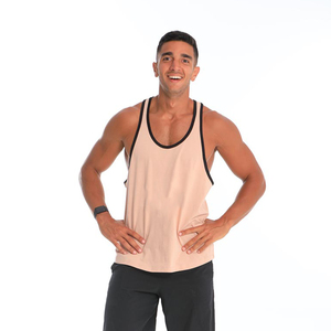 Camiseta sin mangas de punto para hombre, color melocotón sólido, con ribete negro, cuello redondo, para gimnasio - Product Image 1