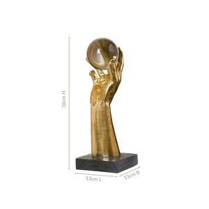 Figurine dorée de style moderniste avec globe en cristal décoratif et base solide et lourde pour bureau, armoire et étagère - Product Image 5