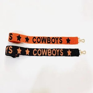 Correa de Tela COWBOYS Negra y Naranja con Hebilla Decorativa de Estrellas en Relieve - Product Image 1