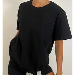 Camiseta Oversize Personalizada al por Mayor para Mujer, Color Sólido, Informal, Verano, Top Largo, OEM, Básica, Moderna - Product Image 1