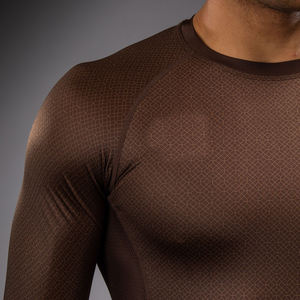 Tenue d'entraînement MMA de haute qualité pour l'extérieur, rashguard à manches longues pour le fitness, designs de logo personnalisés de haute qualité. - Product Image 6