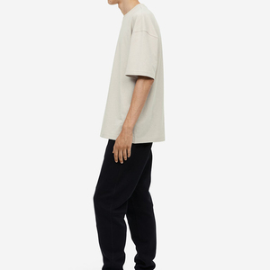 Nouveautés – T-shirt décontracté uni en polyester/coton, coupe longue, coupe-vent, pour homme et femme, idéal pour le sport et la gym, personnalisable en gros - Product Image 1