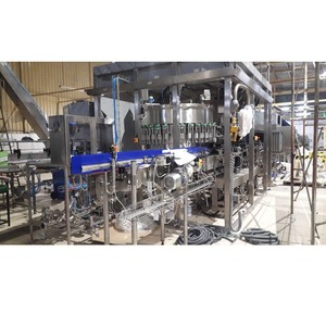 Machine de remplissage automatique de bouteilles en plastique de qualité industrielle à haute capacité avec moteur pour le remplissage de boissons, fabrication et exportation - Product Image 3