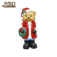 Ourson de Noël en plastique soufflé de Chine, modèle YM8014238, avec chapeau de Père Noël et couronne, décoration de fêtes, vente en gros B2B