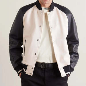 Veste varsity pour homme en crème avec manches en cuir noir, col rabattu, fermeture à un bouton, style décontracté d'automne - Product Image 1