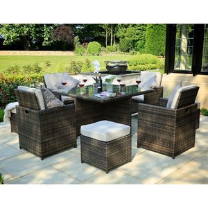 Set da pranzo da esterno in rattan PE marrone da 9 pezzi con comodi pouf e cuscini - Product Image 1