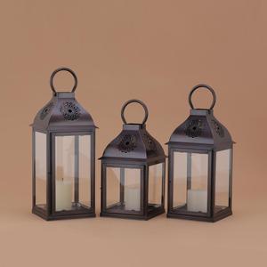 Diseñadas con una construcción metálica duradera y patrones cortados con precisión por láser, estas linternas crean un ambiente cálido y acogedor. - Product Image 1
