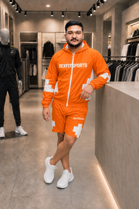 ชุดแจ็คเก็ตและกางเกงขาสั้นกันลมไนลอนสีส้มแบบกำหนดเอง REXFIT SPORTS 2026 แบรนด์ส่วนตัว เสื้อผ้าสตรีทแวร์ผู้ชาย ชุดกีฬา unisex ผ้าจีบ - Product Image 3