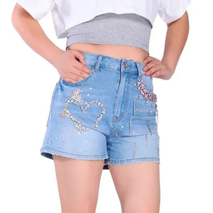 Shorts en jean tendance pour femme, taille haute, super déchirés, délavage personnalisé pour un style estival - Product Image 4