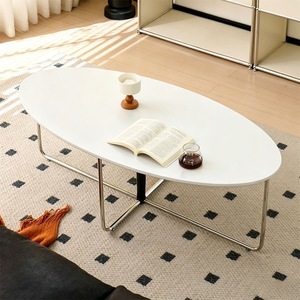 Table basse elliptique minimaliste moderne avec plateau noir mat et pieds tubulaires chromés – Meuble de salon durable et écologique - Product Image 2