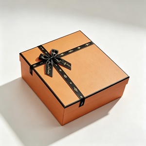 Cajas de Regalo Rígidas Color Naranja, Forma Rectangular con Cinta Negra, Impresión UV, Empaque de Papel de Alta Gama - Product Image 3