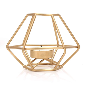 Set of two gold hollow cut-out votive <b>candle</b> <b>holders</b>, available at wholesale prices for decorative tabletop lighting. - Product Image 5