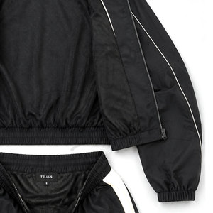 Conjunto deportivo de dos piezas para mujer, estilo streetwear personalizado, cortavientos, largo completo, ligero, de nailon liso. - Product Image 4