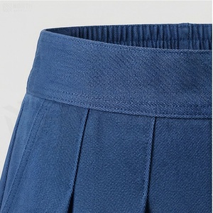 Jupe plissée mini pour femme, couleur unie, taille élastique, respirante, en polyester, à porter en toutes saisons - Product Image 4