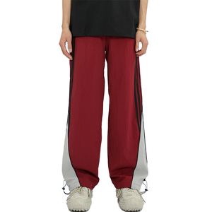 กางเกงขายส่งผู้ชาย ผ้าไนลอน กางเกงวอร์มไนลอนกันลมแบบสั่งทำ กางเกงแทรคไนลอนลายแถบข้างแบบต่อผ้า กางเกงขายาวผู้ชาย - Product Image 1