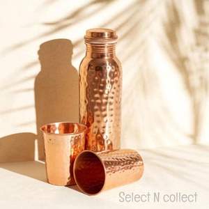 Copper <b>bottle</b> that <b>blends</b> into everyday routine offering a sense of familiarity and reliable hydration throughout the day - Product Image 4