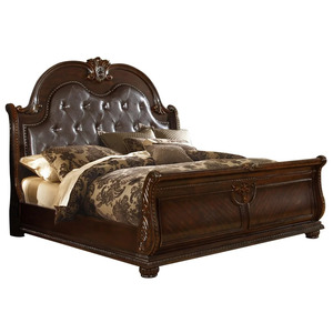 Mahogany <b>Panel</b> Bed features an upholstered <b>headboard</b> and intricate wood carvings with nightstands and mirrors for bedroom use - Product Image 2