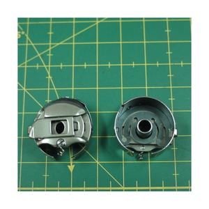 ME0503000NBL PIEZAS DE MÁQUINA DE COSER INDUSTRIAL CAJA DE BOBINA para TAJIMA - Product Image 1