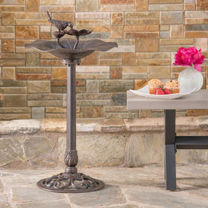 Bain d'oiseaux en métal pour jardin extérieur, design robuste, finition résistante aux intempéries, parfait pour embellir le paysage et attirer les oiseaux - Product Image 1